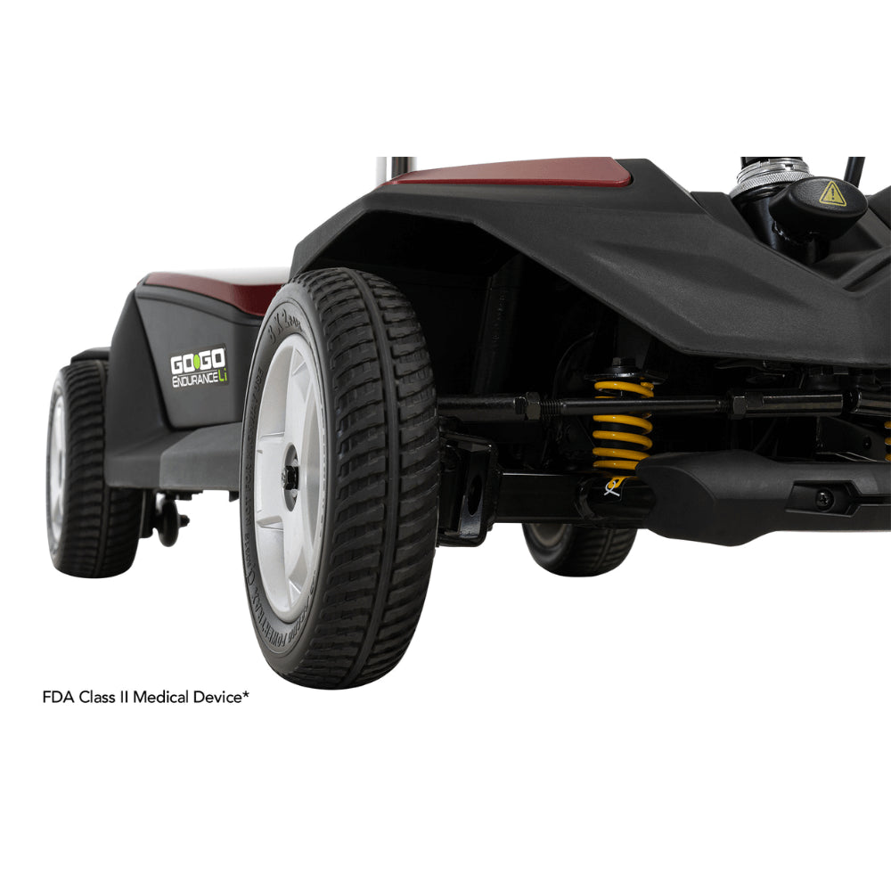 Red Color Pride Go Go® Endurance Li Mobility Scooter - Close-up View of the Wheels