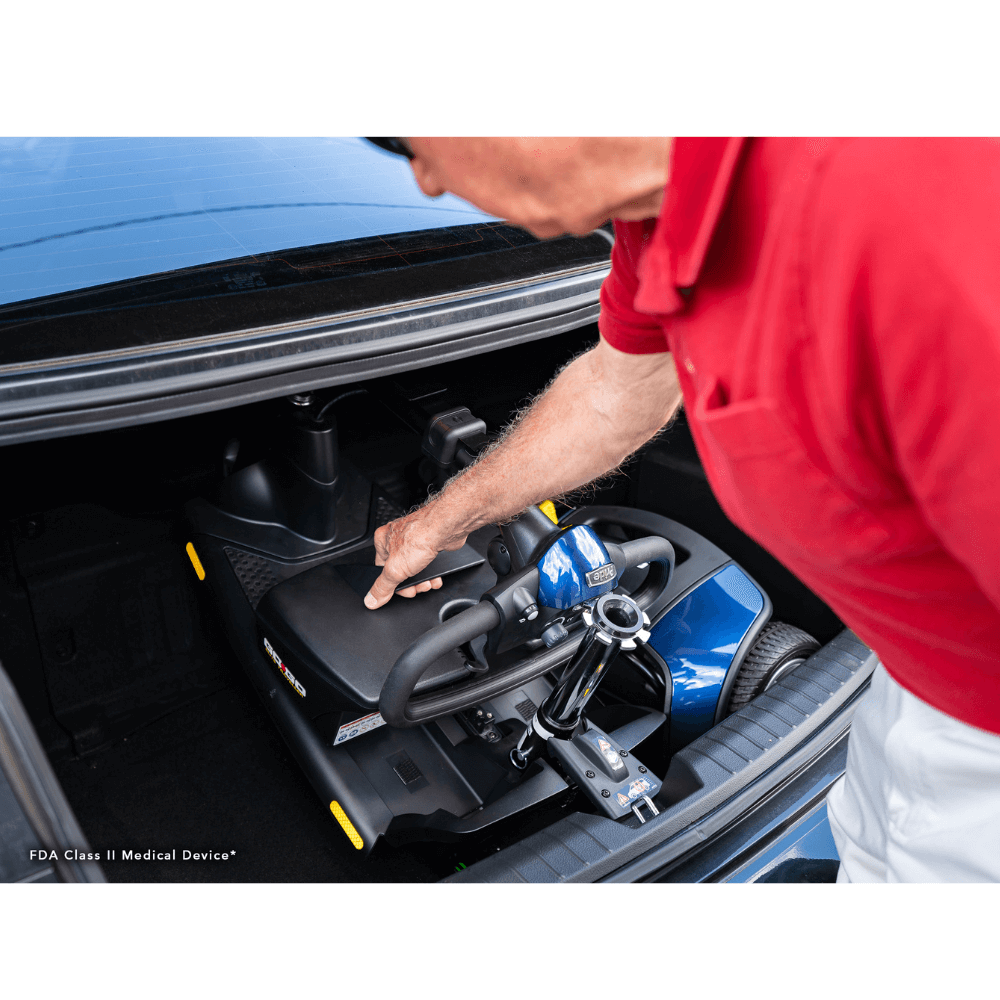 Blue Pride Go Go Elite Traveller® 3-Wheel Scooter 18AH Battery in the Trunk of a Car