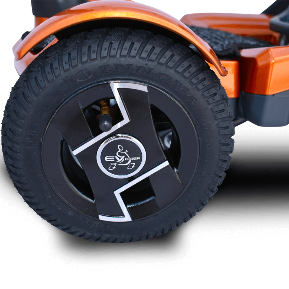 Metallic Gold EV Rider TeQno Automatic Folding Mobility Scooter Folded - Right Wheel Close-up View