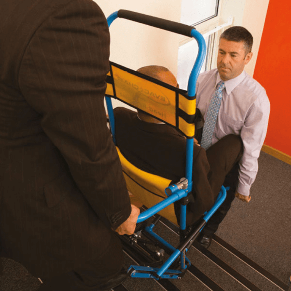 Dual-Position Evacuation Chair - Patient being safely assisted downstairs