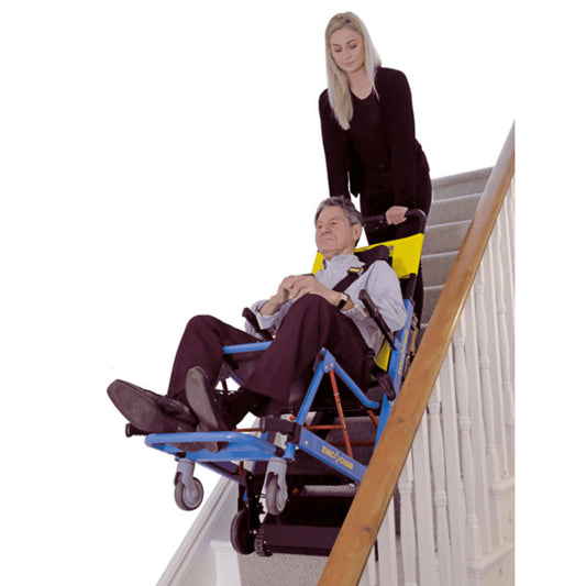 EVAC+CHAIR Power 900 Battery Operated Electric Evacuation Chair - Patient being safely assisted downstairs