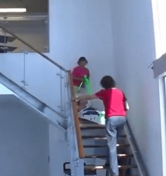 EVAC+CHAIR RESQME Medical Patient Evacuation Sled - Patient being brought down