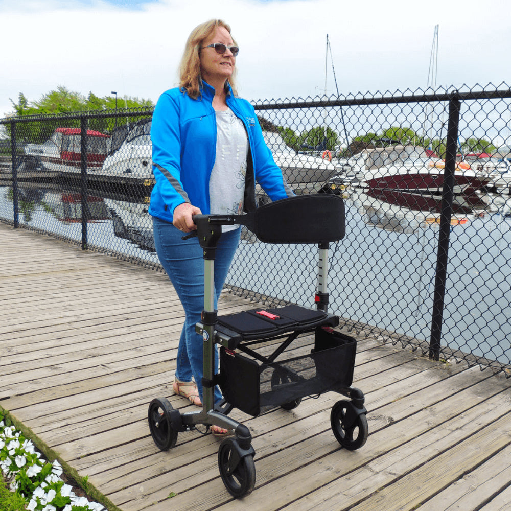 Triumph Mobility Escape Adjustable Rollator - Lady using the Rollator