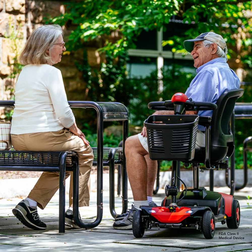 Pride Go Go Elite Traveller® Gen 3 4-Wheel Mobility Scooter in Cardinal Red Color -  Garden Display