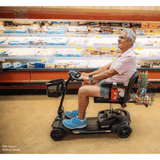 Pride Go Go® Ultra X Gen 3 4-Wheel Mobility Scooter In the Supermarket