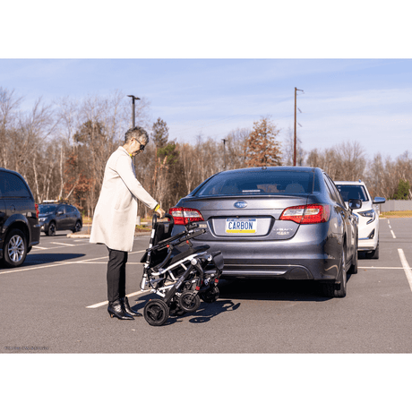  Pride Jazzy Carbon Lightweight Power Wheelchair in the Parking Lot