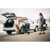  Pride Jazzy Carbon Lightweight Power Wheelchair in the Parking Lot
