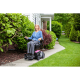 Rose Quartz Color Pride Go Chair® Portable Disassembling Power Wheelchair in the Garden