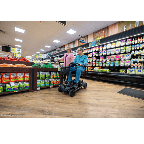 Pride Go Go Elite Traveller® 2 Mobility Scooter in the Grocery Store