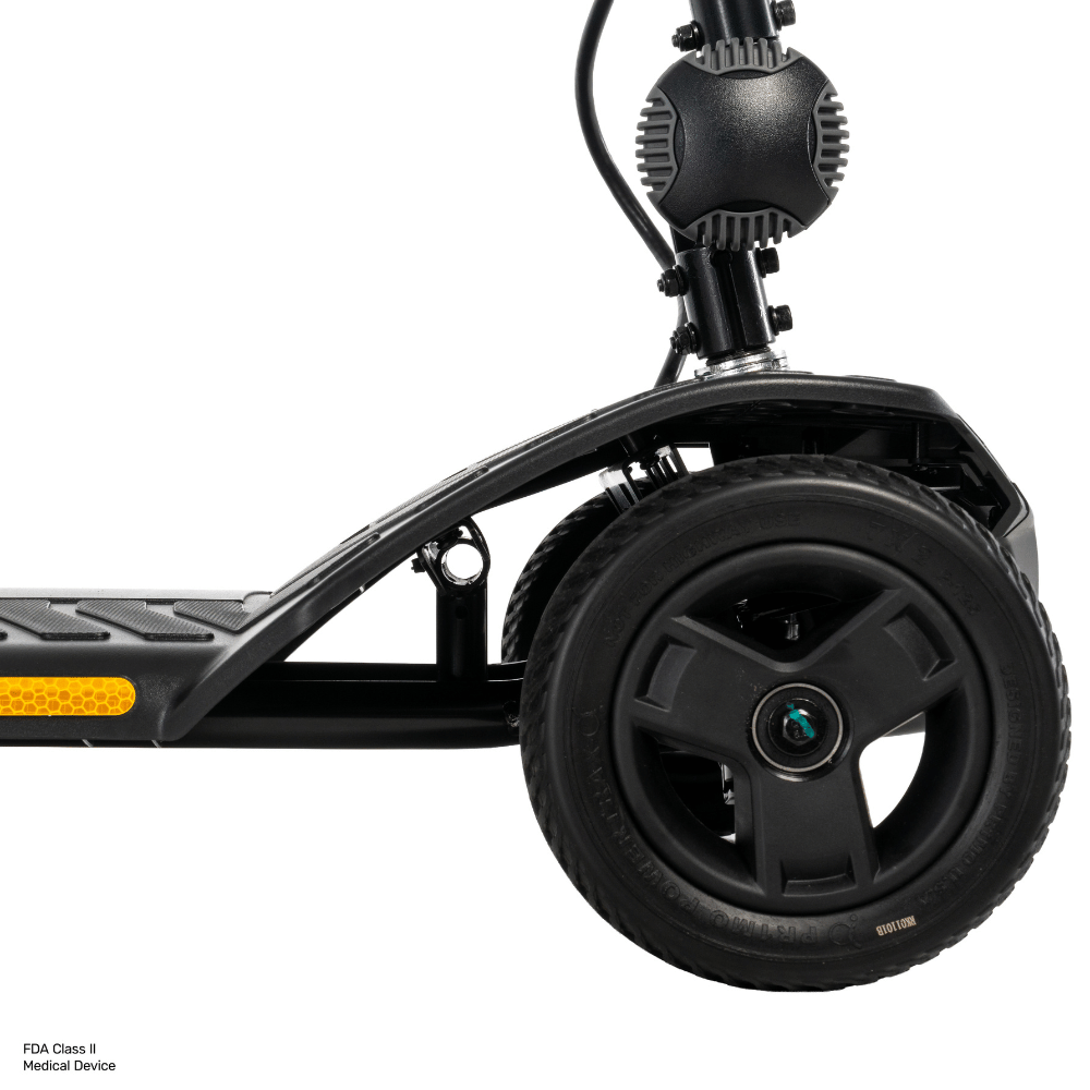 Pride Go Go® Ultra X Gen 3 4-Wheel Mobility Scooter In black Color -  Front Wheel Closeup View