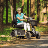 Matte Gray Pride Pursuit 2 Outdoor Mobility Scooter - Lifestyle View