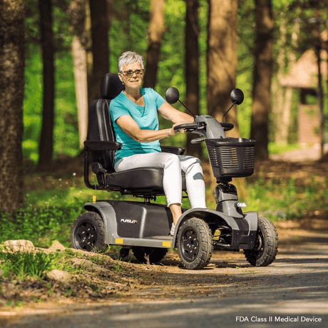 Matte Gray Pride Pursuit 2 Outdoor Mobility Scooter - Lifestyle View