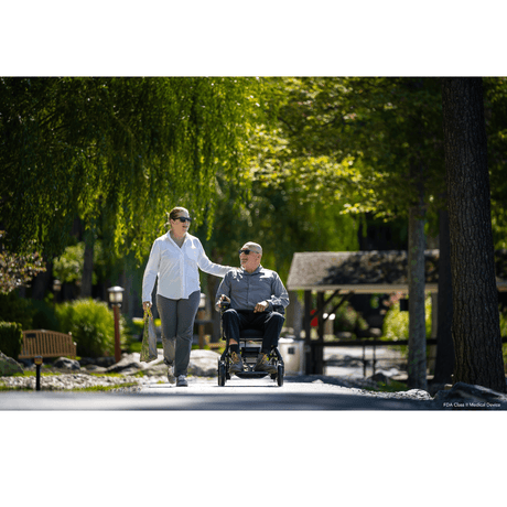 Pride Jazzy Ultra Light Power Wheelchair Under the Trees Display