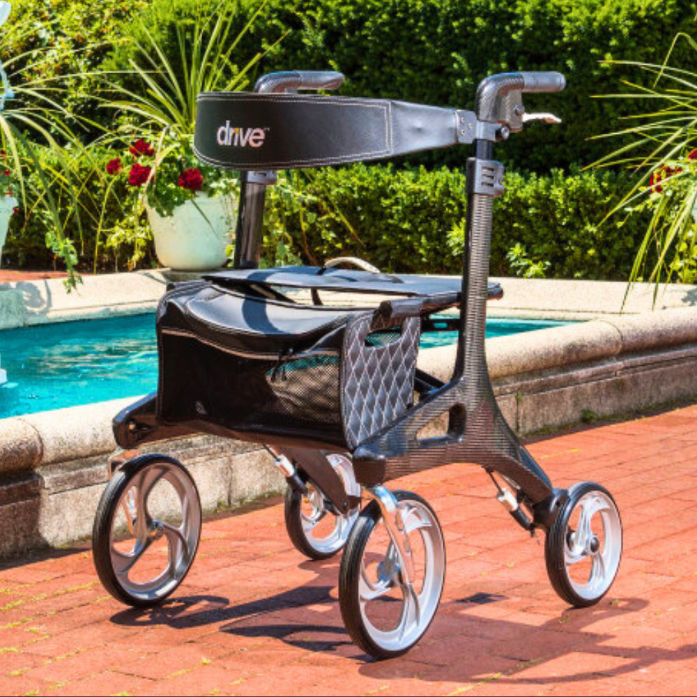 Drive Medical Nitro Elite Carbon Fiber Rollator Displayed by a Poolside