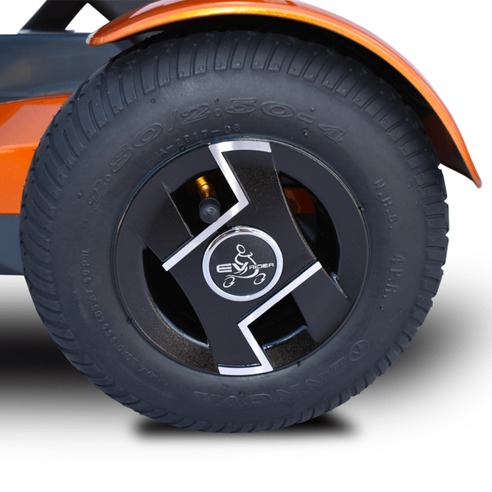 Metallic Gold EV Rider TeQno Automatic Folding Mobility Scooter Folded - Left Wheel Close-up View