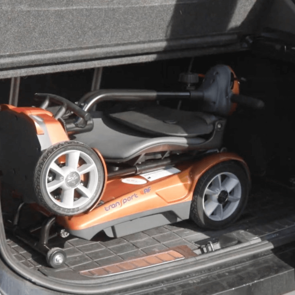 Jupiter Gold EV Rider 4AF Automatic Folding Mobility Scooter at the back of a car