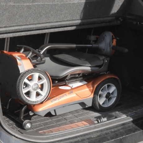 Jupiter Gold EV Rider 4AF Automatic Folding Mobility Scooter at the back of a car