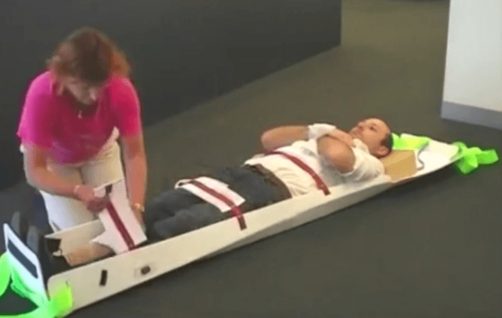 EVAC+CHAIR RESQME Medical Patient Evacuation Sled - Displaying proper usage