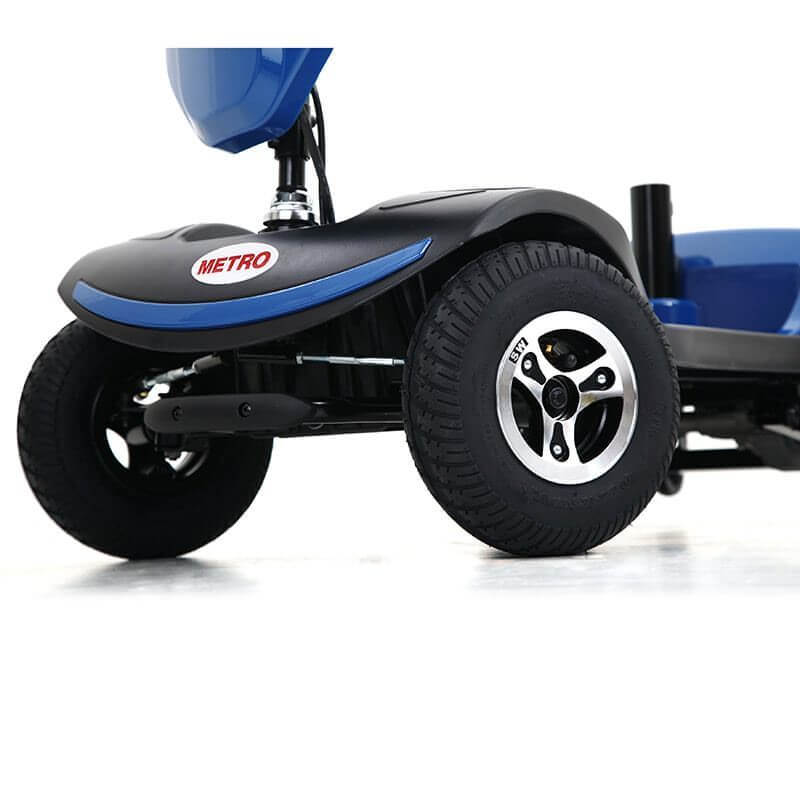 Blue Metro Mobility Patriot 4-Wheel Travel Mobility Scooter - Rear Wheel Close-up View