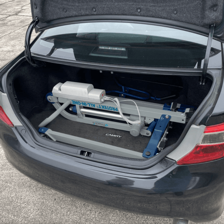 Proactive Medical Protekt All-In-One Folding Car Transfer Electric Patient Lift (350 lbs. Capacity) Folded Device in the trunk of a car