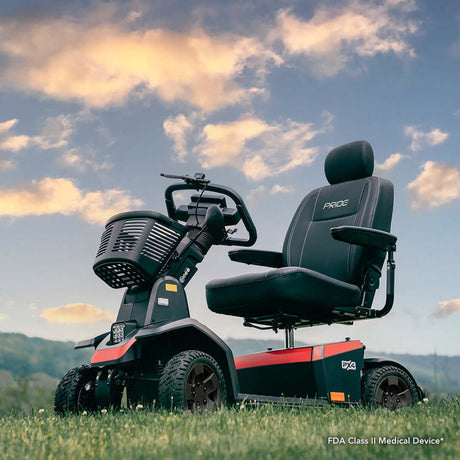 Red Color Pride PX4 All Terrain Mobility Scooter - On Grass Field
