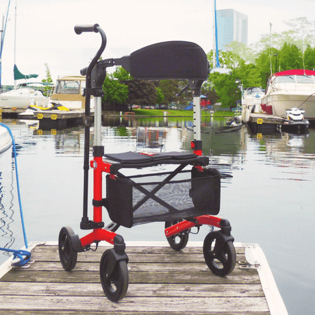 Red Triumph Mobility Escape Adjustable Rollator on the dock