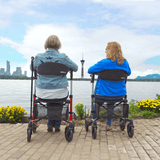 Triumph Mobility Escape Adjustable Rollator being used by two people