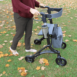 Triumph Mobility Maverick Carbon Fibre Rollator being used in grassy area
