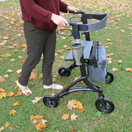 Triumph Mobility Maverick Carbon Fibre Rollator being used in grassy area
